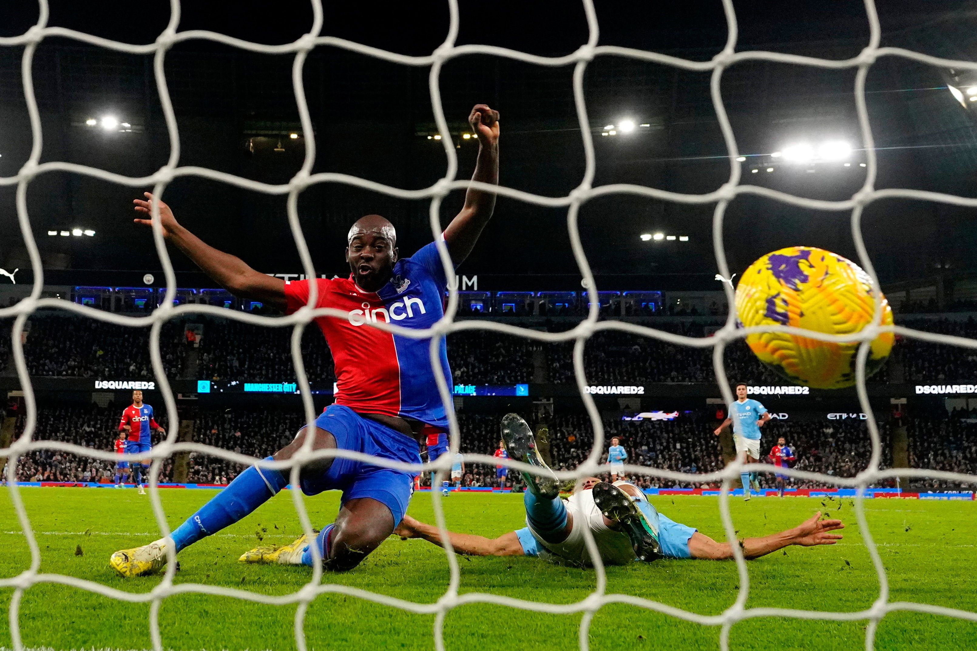 Late penalty rocks Man City as Palace hold champions