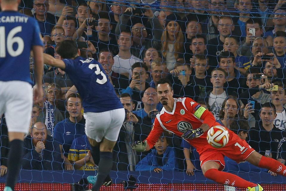 Everton's Leighton Baines scores his team's third goal from a penalty past VfL Wolfsburg's Diego Benaglio. Photo credit: REUTERS/Andrew Yates