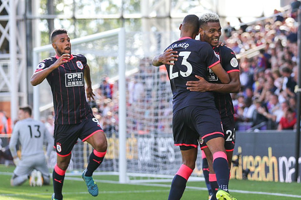 LONDON, ENGLAND - AUGUST 12: Steve Mounie of Huddersfield Town celebrates after scoring a goal to make it 0-3 during the Premier League match between Crystal Palace and Huddersfield Town at Selhurst Park on August 12, 2017 in London, England. (Photo by Robbie Jay Barratt - AMA/Getty Images)