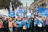 thumbnail: Marchers head through Merrion Square in central Dublin yesterday at a rally in support of nurses’ and midwives’ pay campaign. Picture: Frank McGrath