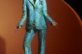 thumbnail: Aquamarine jacket, trousers and slipper shoes from the Iris Apfel X H&M collection
