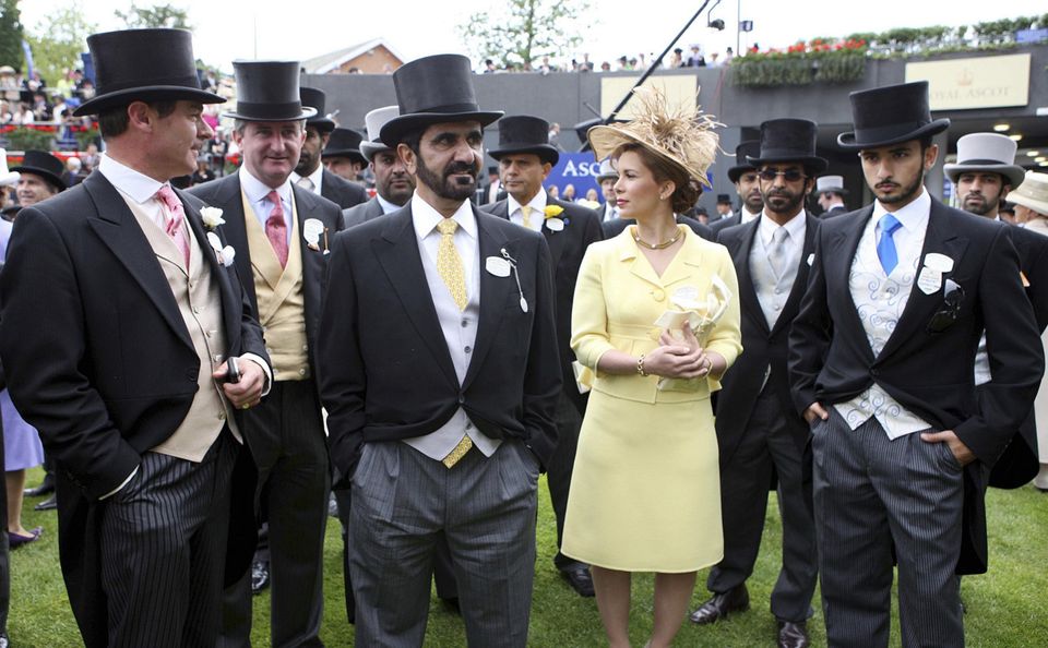 Foiled: Princess Latifa's father and stepmother, Sheikh Mohammed bin Rashid Al Maktoum and Princess Haya (centre) at Ascot racecourse in England