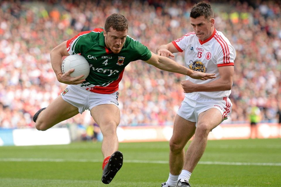 Chris Barrett, Mayo, in action against Darren McCurry