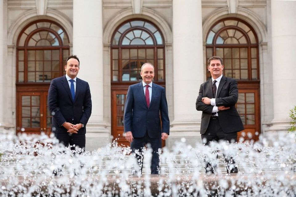 Coalition leaders Leo Varadkar, Micheál Martin and Eamon Ryan Photo: Julien Behal