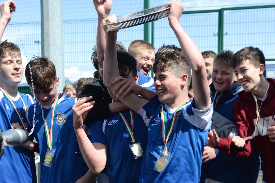 19/05/15. Captain Ryan Eustace of Templeouge College celebrating winning  the Under 15s soccer final between Colaiste Phadraig CBS and Templeouge College at Peamount Utd.
Pic: Justin Farrelly.