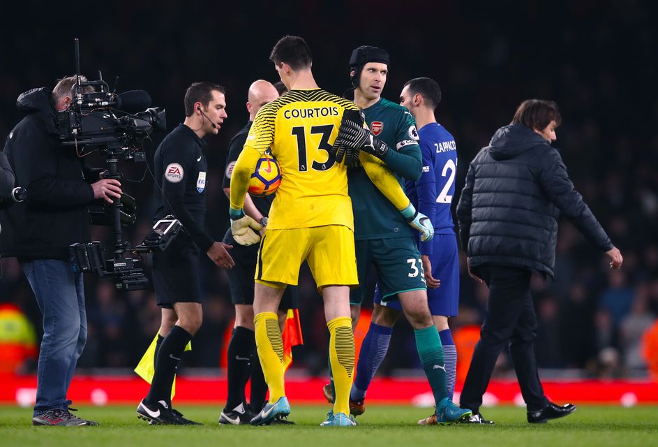 Cech (right) helped Arsenal reach the Carabao Cup final with victory over his former club Chelsea.