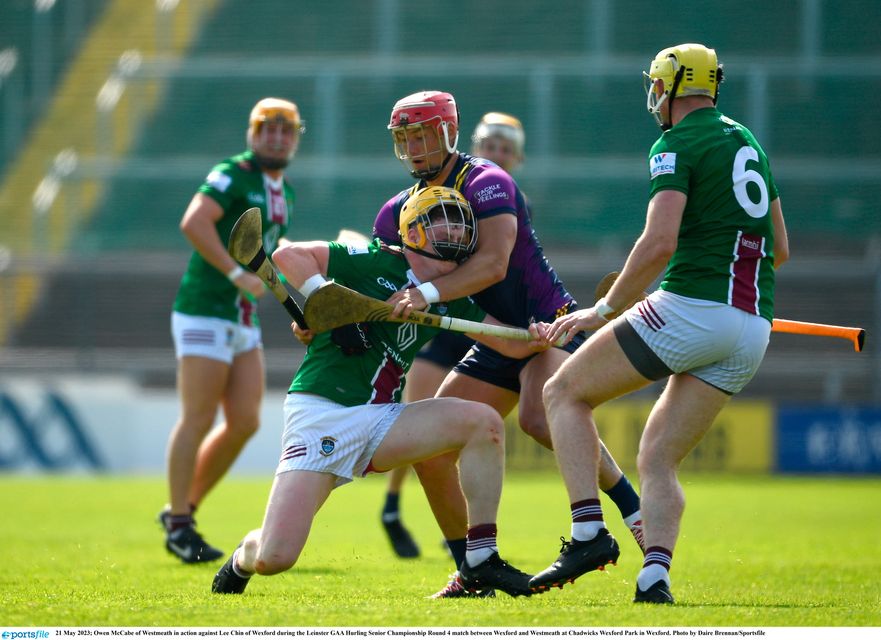 21 May 2023; Owen McCabe of Westmeath in action against Lee Chin of Wexford during the Leinster GAA Hurling Senior Championship Round 4 match between Wexford and Westmeath at Chadwicks Wexford Park in Wexford. Photo by Daire Brennan/Sportsfile