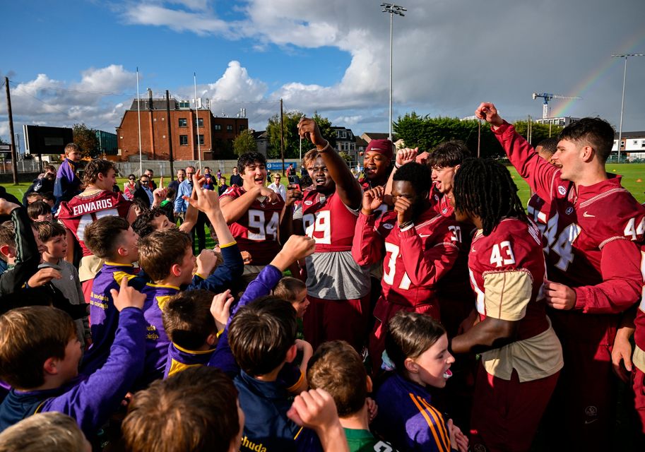 23 August 2024; Players from Florida State engage in a sing-song after a football clinic at Kilmacud Crokes GAA Club in Dublin, ahead of the 2024 Aer Lingus College Football Classic match between Florida State and Georgia Tech at the Aviva Stadium this Saturday. Photo by Brendan Moran/Sportsfile 