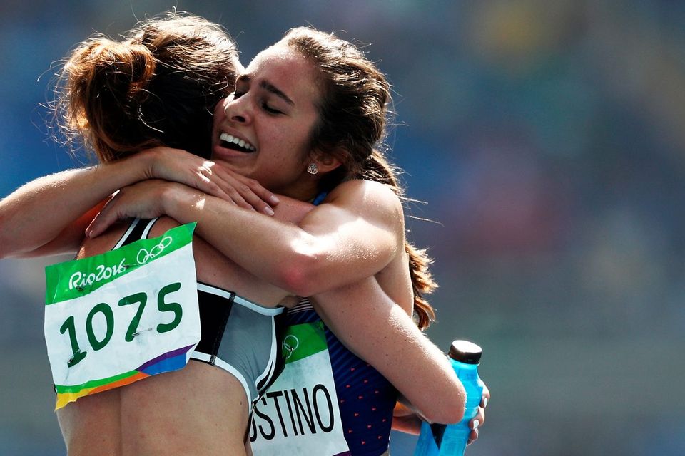 'There were many examples of this true spirit of the Olympics in Rio, perhaps most notably in the heats of the women’s 5,000m, when Abbey D’Agostino of the US and Nikki Hamblin of New Zealand tripped and fell. The two athletes then helped each other to the finish line.' Photo: Getty