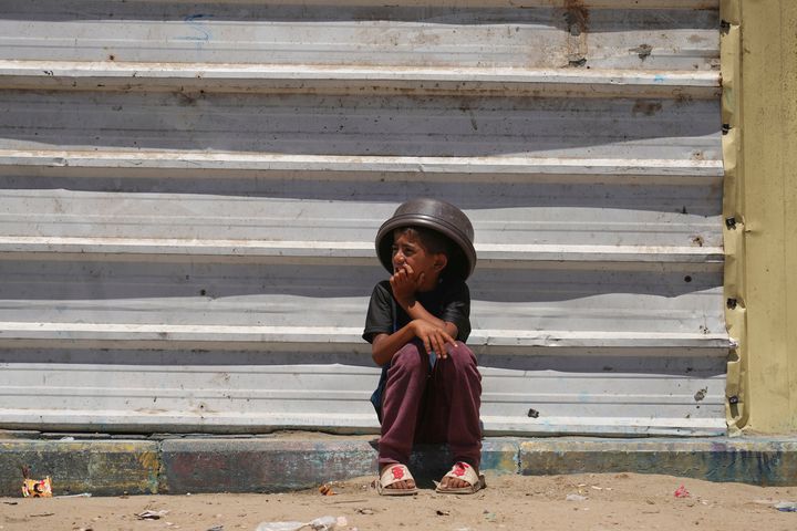 Israeli strike kills 14 Palestinians & including five women and seven children - in Gaza camp