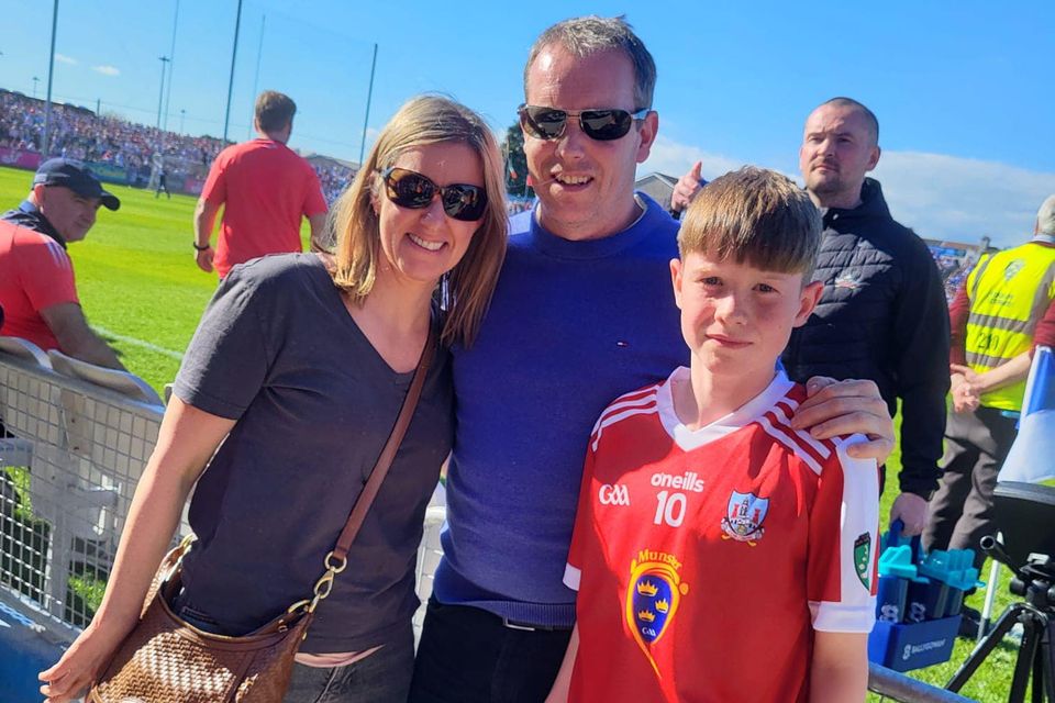 Killavullen's Fionán Murphy and his parents, Barry and Clare, at the Cork Vs Waterford game last Sunday.