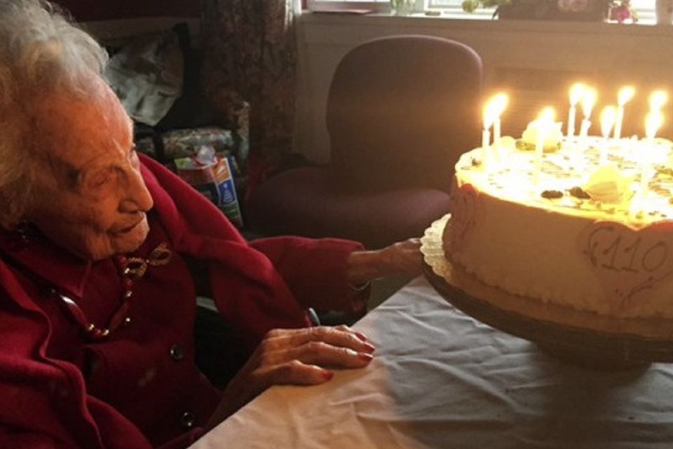Emily Tremonti admires her 110th birthday cake (Mary-Kate Mele/AP)