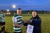 thumbnail: Eric Valentine of Gorey Celtic accepting the Division 5 trophy from Nicky Murphy.