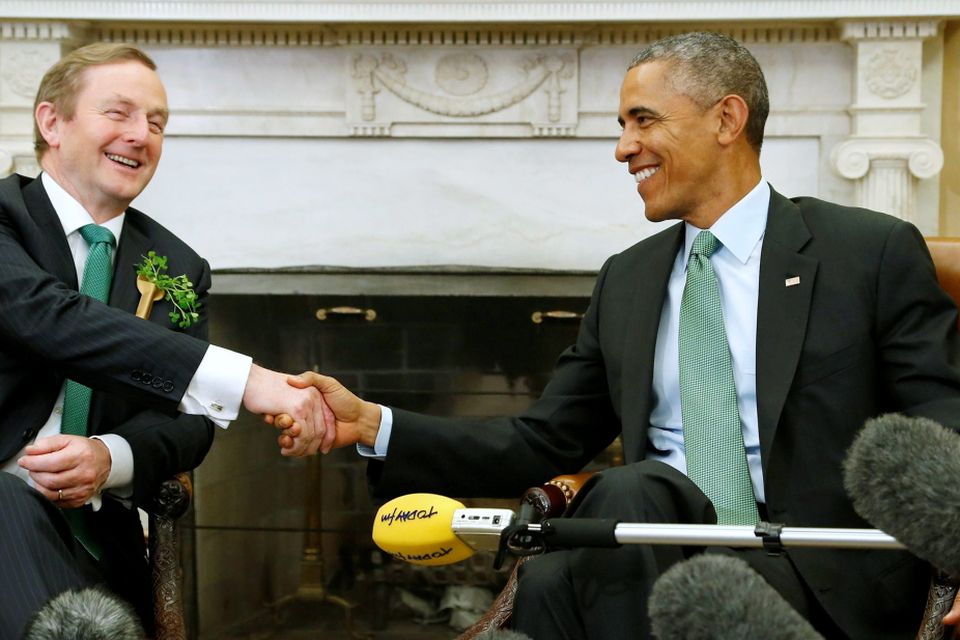 U.S. President Barack Obama (R) welcomes Ireland's Prime Minister Enda Kenny (L) to the Oval Office for a St. Patrick's Day visit at the White House in Washington March 17 2015. REUTERS/Jonathan Ernst