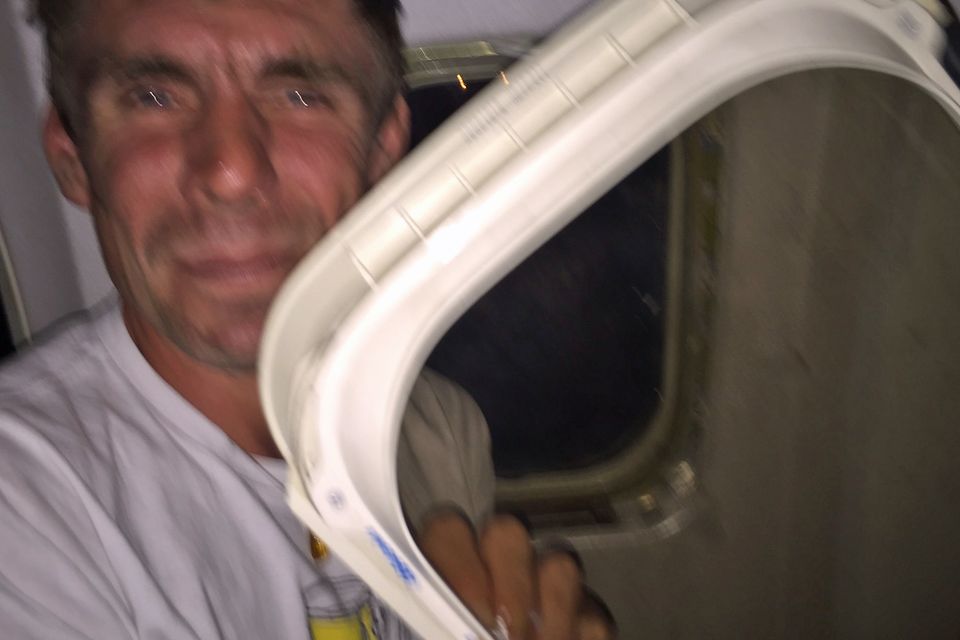 Laurence Gibson was left traumatised after the window reveal fell on to him as the Ryanair flight touched down at London Stansted around 12.30am on July 26. Photo: Caters