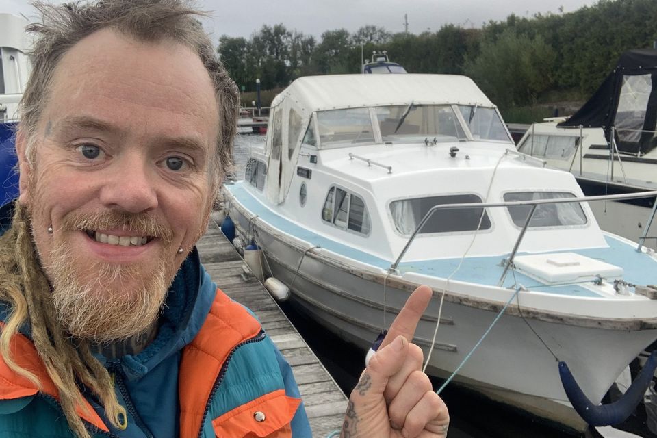 JuJu Jay at his boat. 