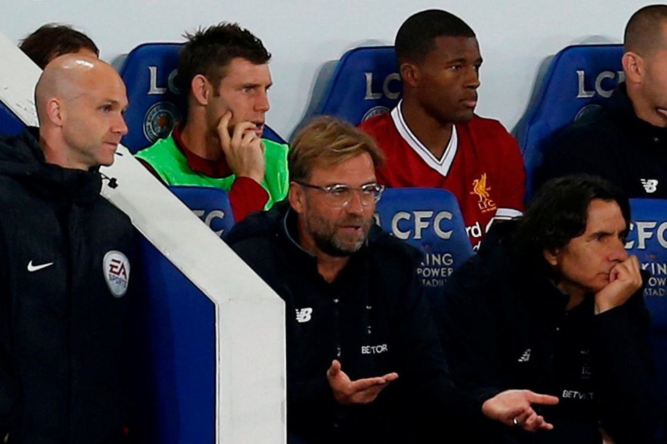 Liverpool manager Jurgen Klopp speaks to the fourth official Anthony Taylor during tonight's defeat
