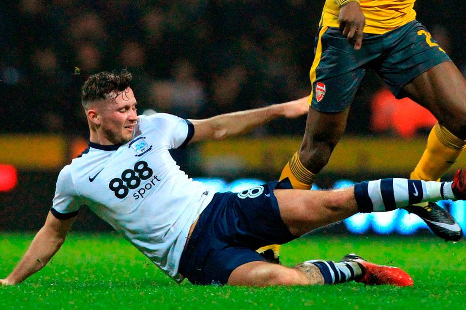Alan Browne makes a sliding tackle on Danny Welbeck at Deepdale Picture: Getty