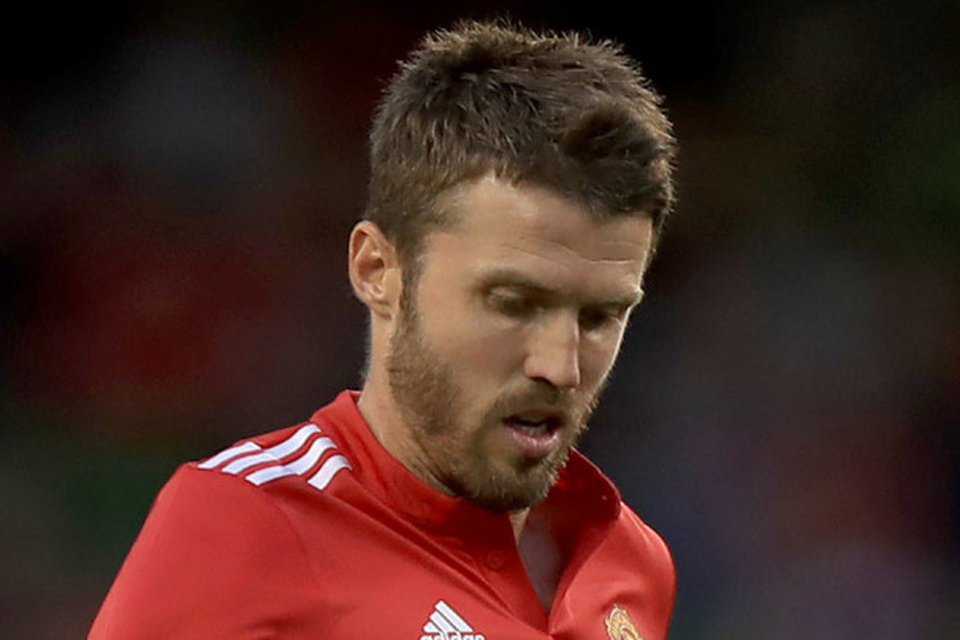 Manchester United's Michael Carrick is captain of the Old Trafford club this season Photo: PA News