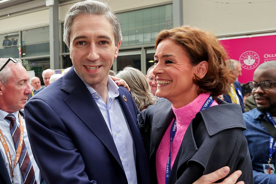 Simon Harris with Kate O’Connell, who has spoken about his potential to be a ‘disrupter’, at Fine Gael’s ard fheis in Galway. Photo: Gerry Mooney