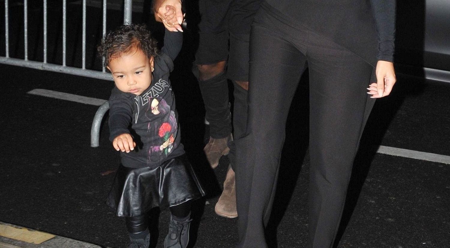 Kim Kardashian dresses adorable mini-me North West in matching dazzling  outfit for night out at daddy's gig