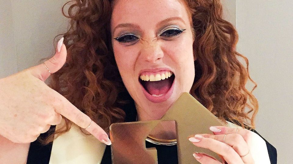 Jess Glynne with her gold Official Number 1 Album Award for I Cry When I Laugh (Official Charts Company/PA)