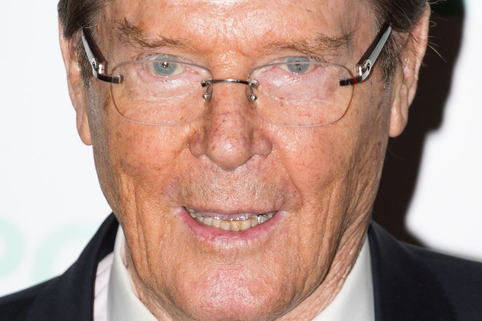 Sir Roger Moore has paid tribute to Guy Hamilton