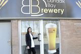 thumbnail: Faye Healy at the entrance to Dundalk Bay Brewery
