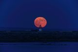 thumbnail: The moon over Mutton Island lighthouse in Galway. Photo: Chaosheng Zhang