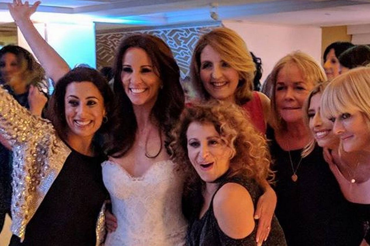 andrea-mclean-beams-in-strapless-lace-wedding-gown-as-she-celebrates