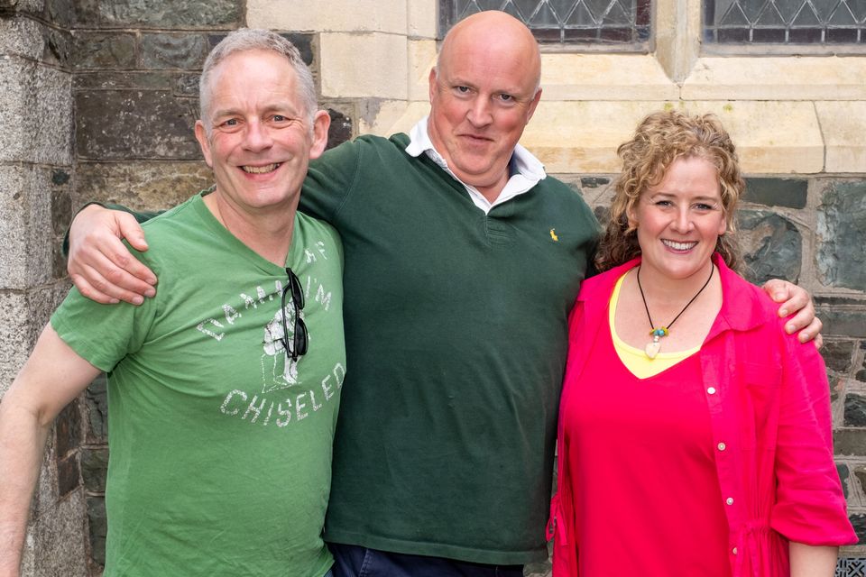 Aubrey McCarthy of Tiglin (centre), with Unity Gospel Choir directors Neville Cox and Jamie Lyon.