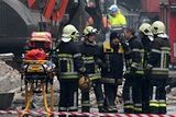 thumbnail: Firemen clear debris around a collapsed building in Liege, in Belgium (AP)