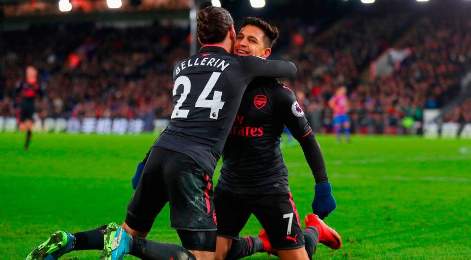 Alexis Sanchez of Arsenal celebrates as he scores their third goal   Photo: Getty