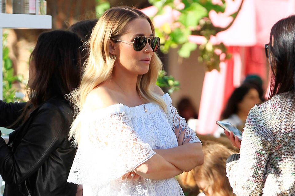 The Hills star Lauren Conrad enjoys the nice weather with a friend
