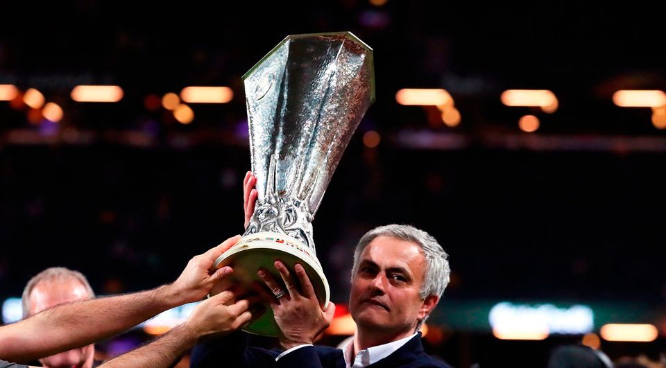 Manchester United manager Jose Mourinho with the trophy as he celebrates winning the UEFA Europa League Final at the Friends Arena in Stockholm