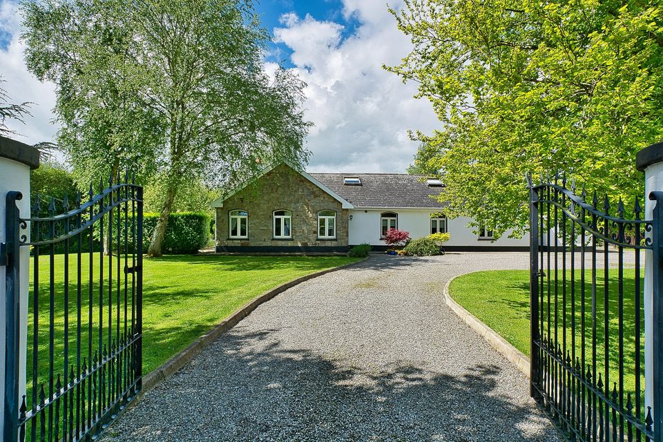 Entry gates leading to Sylvan Cottage