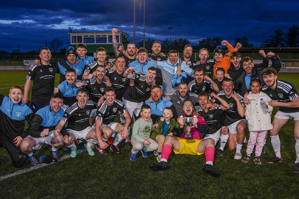 The Kingdom Corinthians players celebrate winning the Division 3 League Final against Ballyheigue Athletic B at Mounthawk Park. Photo by Mark O’Sullivan