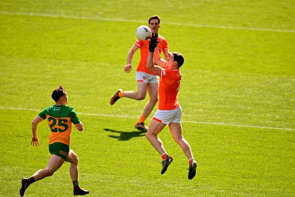 Paddy Burns of Armagh in action against Luke McGlynn of Donegal. Picture: Sportsfile