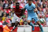 thumbnail: Arsenal's Danny Welbeck tussles with Manchester City's Martin Demichelis during the Barclays Premier League match at the Emirates Stadium, London