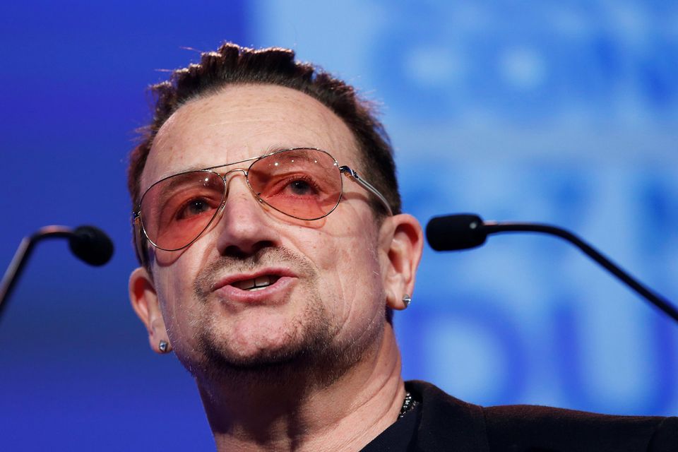 Singer Bono of U2 speaks at the European People's Party (EPP) Elections Congress in Dublin March 7, 2014. REUTERS/Suzanne Plunkett