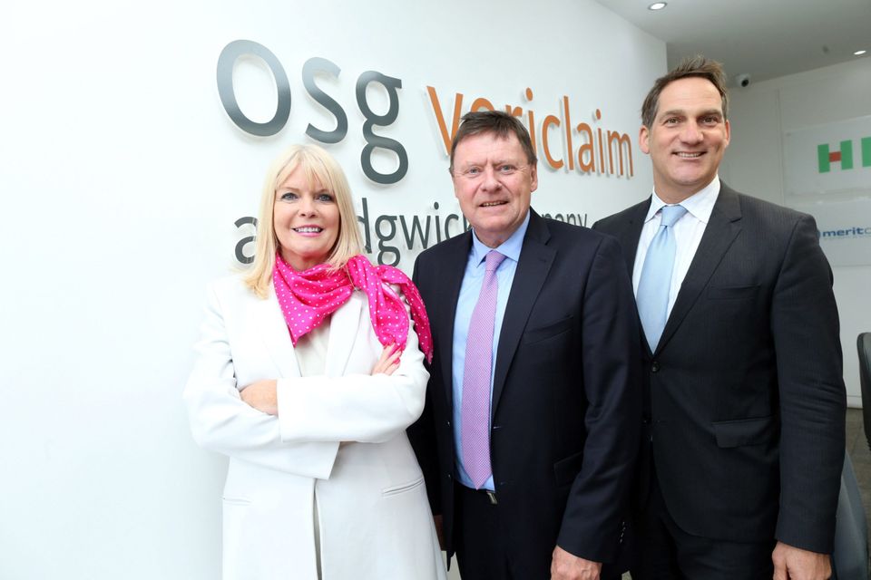 Minister for Jobs, Enterprise and Innovation Mary Mitchell O’Connor, Malcolm Hughes, chief executive of OSG Vericlaim, and Mike Arbour, division president, international accounts, Sedgwick, at yesterday’s announcement. Photo: MaxwellsIreland