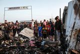thumbnail: Palestinians look at the destruction after an Israeli strike where displaced people were staying in Rafah, southern Gaza. Health workers said at least 35 people were killed in the area. Photo: AP