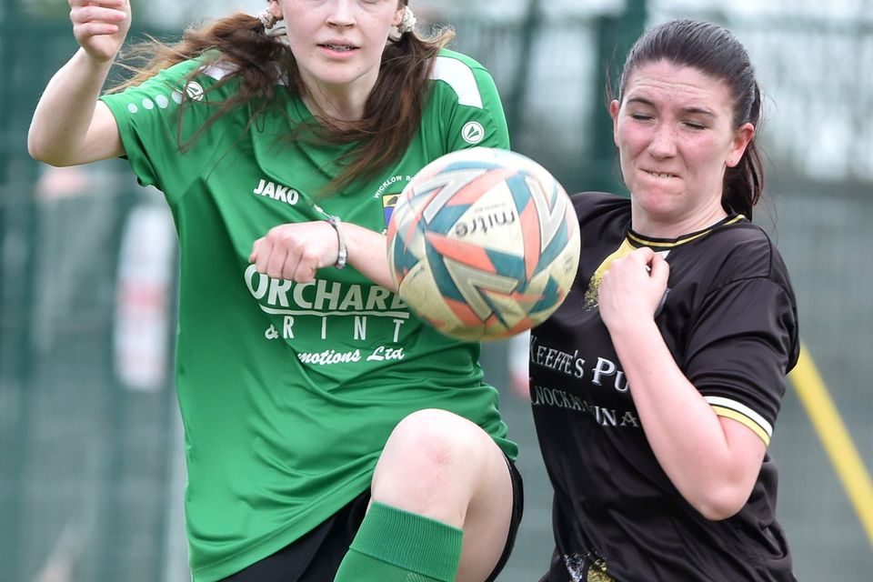 Carnew FC's Lara Murphy challenges Sinead Caffery of Wicklow Rovers during the Divisional Shield final at Gorey Rangers grounds on Sunday. 
