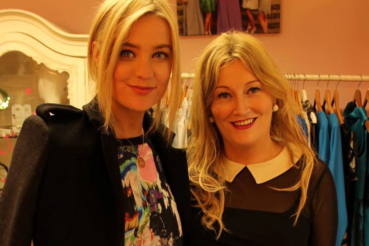 Busy sales ring in late festive cheer for embattled retailers
