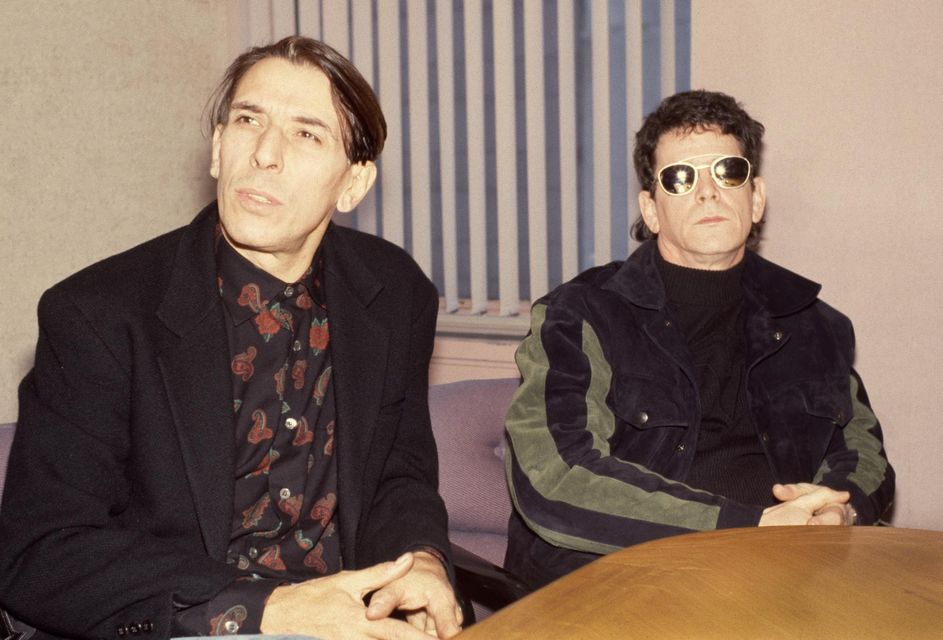 John Cale and Lou Reed, former bandmates in the Velevet Underground, in 1989. Photo by Rita Barros/Getty Images