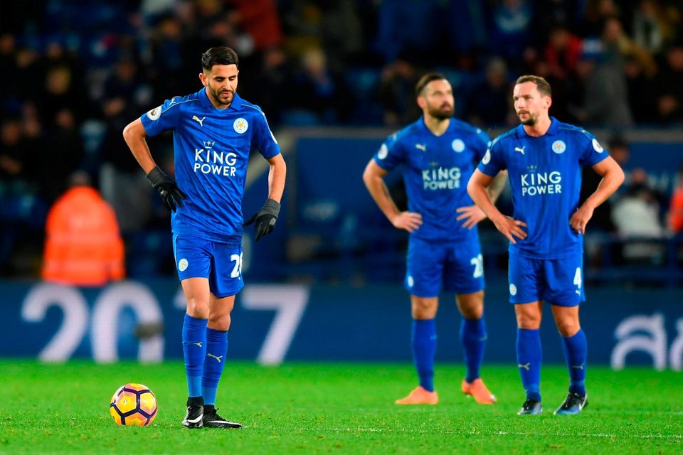 Riyad Mahrez (L) and teammates look dejected during the Premier League match between Leicester City and Everton at The King Power Stadium yesterday