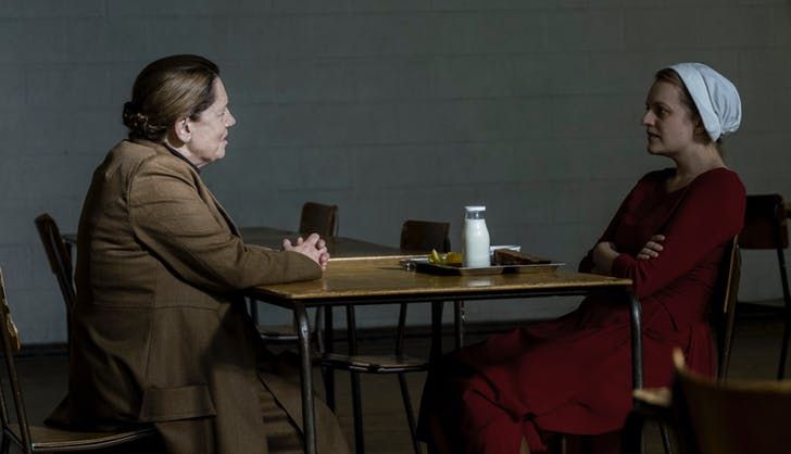 Ann Dowd and Elizabeth Moss as Aunt Lydia and Offred in The Handmaid's Tale
