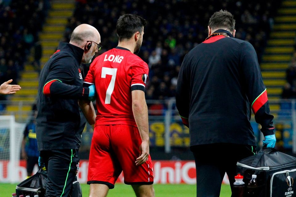 Southampton's Shane Long goes off injured at the San Siro last night