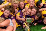 thumbnail: The Wexford players celebrate their victory over New York in yesterday's junior decider at Croke Park. Brendan Moran / SPORTSFILE