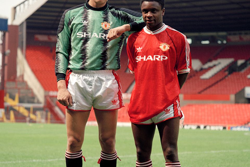Manchester United footballers Peter Schmeichel (left) and Paul Parker at Old Trafford in Manchester, circa August 1991. (Photo by Harry Goodwin/Paul Popper/Popperfoto/Getty Images)